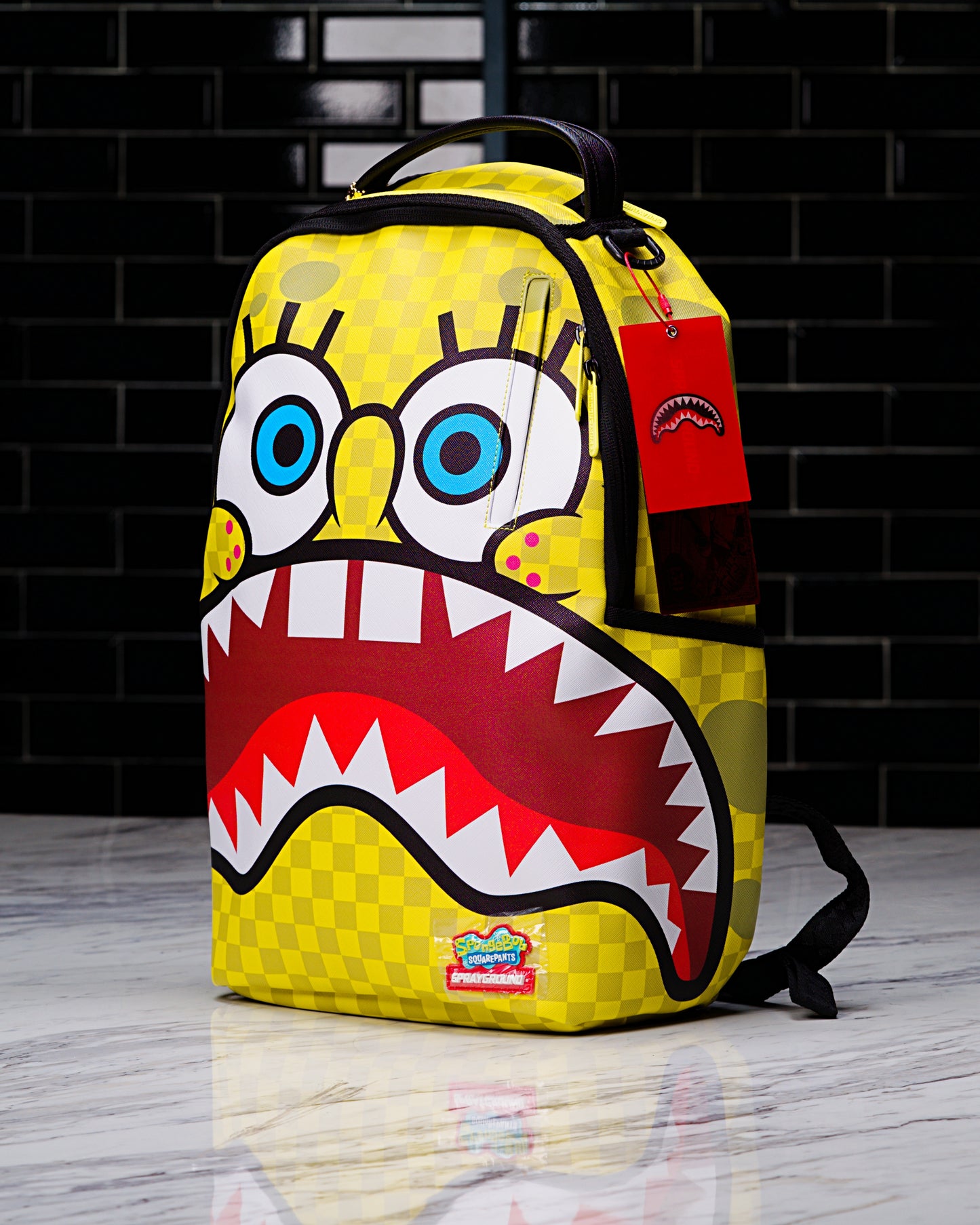 MOCHILA SPONGEBOB CHECKERBOB DLXSV BACKPACK
