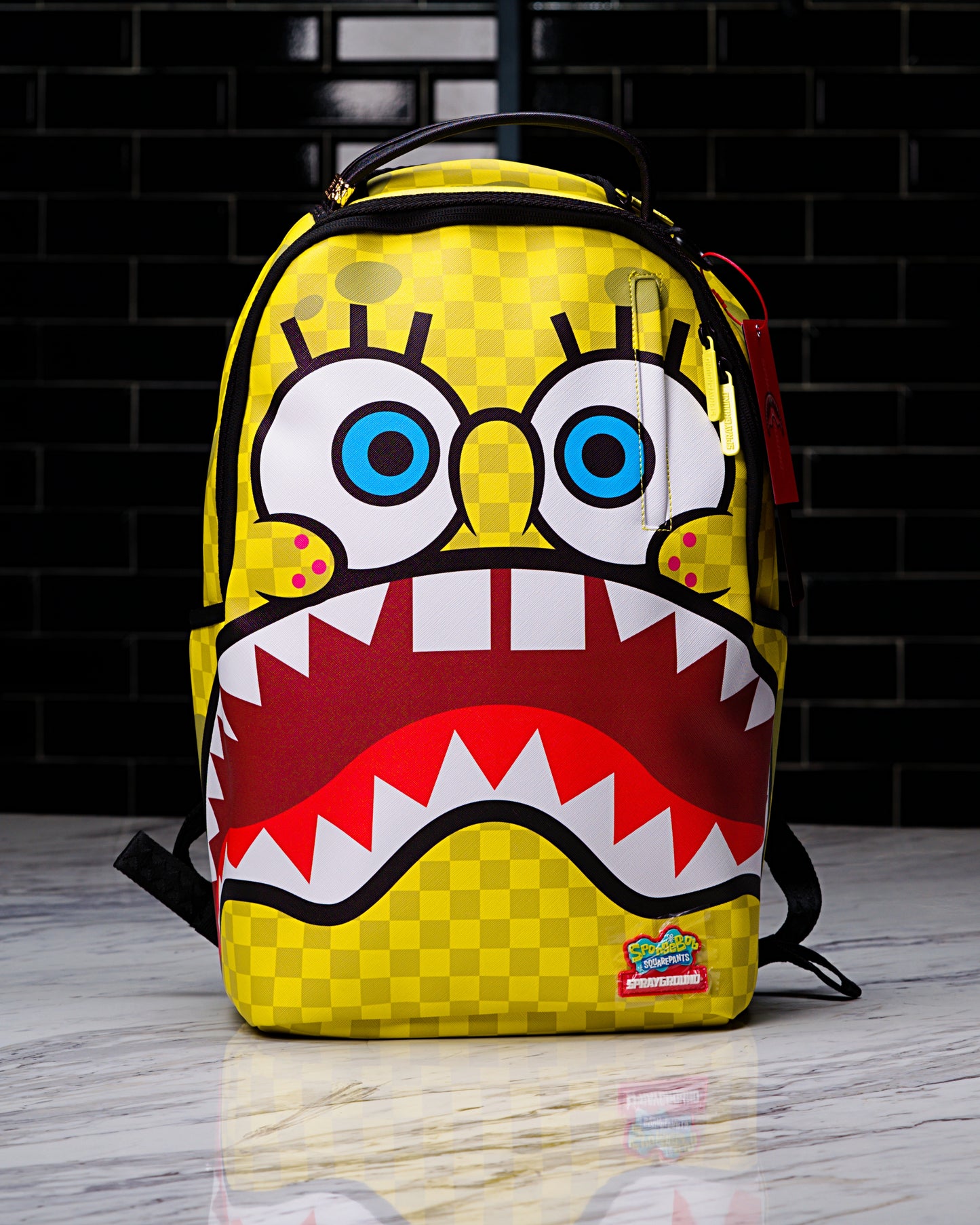 MOCHILA SPONGEBOB CHECKERBOB DLXSV BACKPACK